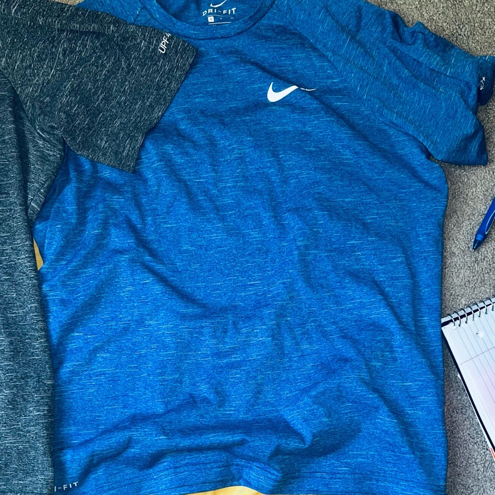 2 Nike women’s dri fit swim T bundle $10.00 
 Both are Sz Small